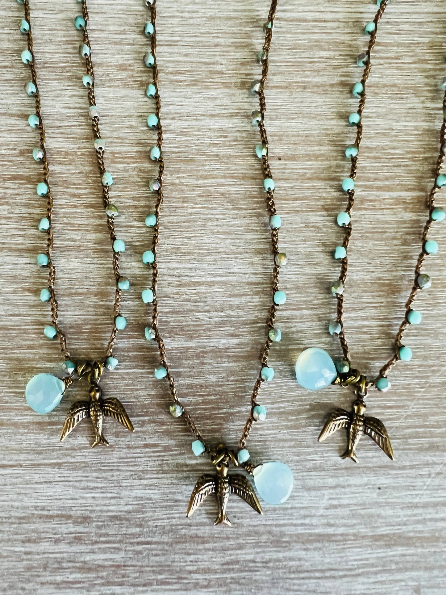 Flying Through Raindrops Bird Necklace With Chalcedony Drop