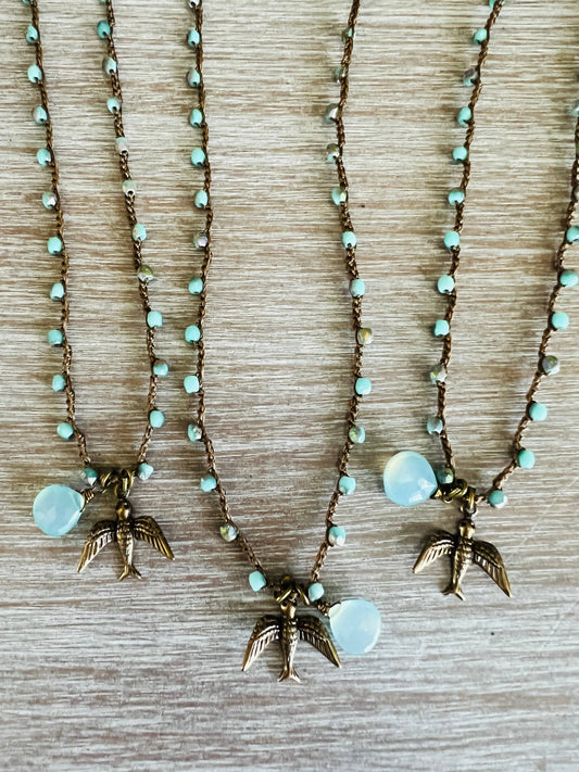 Flying Through Raindrops Bird Necklace With Chalcedony Drop